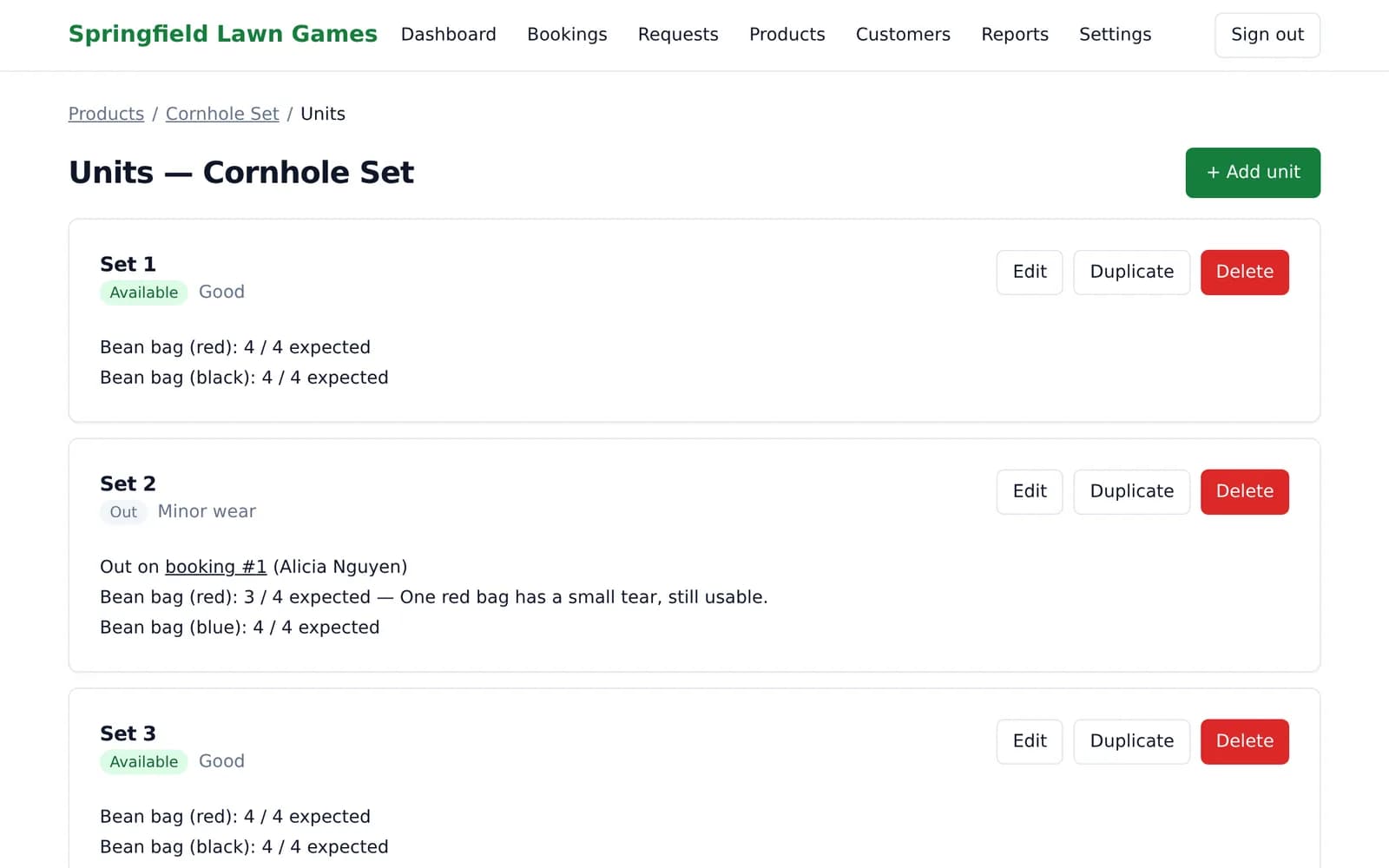 The units page for a Cornhole Set. Set 1 is available with all four red and four black bean bags. Set 2 is out on a booking, with three of four red bean bags and a note that one has a small tear. Set 3 is available.